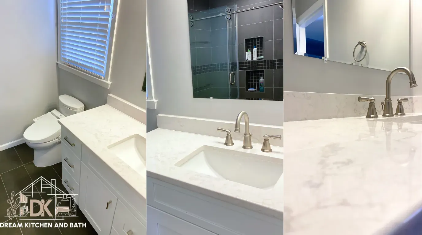 Standard 5x8 hall bathroom remodel in Manassas, Virginia featuring white shaker vanity with brushed nickel hardware, quartz countertop with subtle veining, comfort-height toilet, dark large-format floor tile, and frameless glass shower visible in mirror reflection.