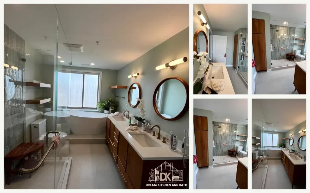 Mid-range bathroom remodel in Northern Virginia featuring large-format gray porcelain tile shower with twin recessed niches, frameless glass enclosure, brushed nickel handheld showerhead, and quartz-top vanity with navy blue shaker cabinetry.