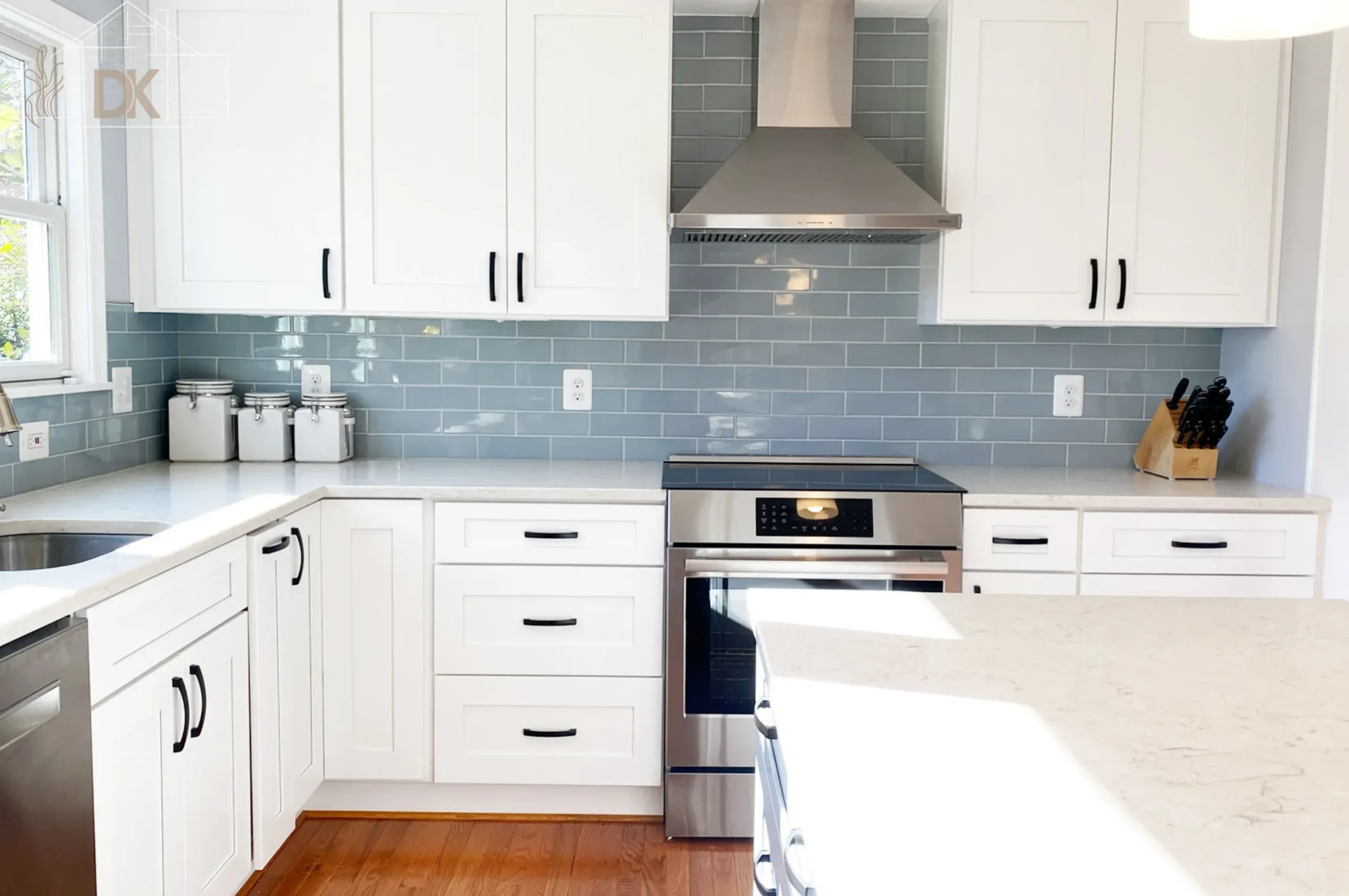 white-shaker-kitchen-blue-subway-backsplash-stainless-hood-black-hardware-manassas