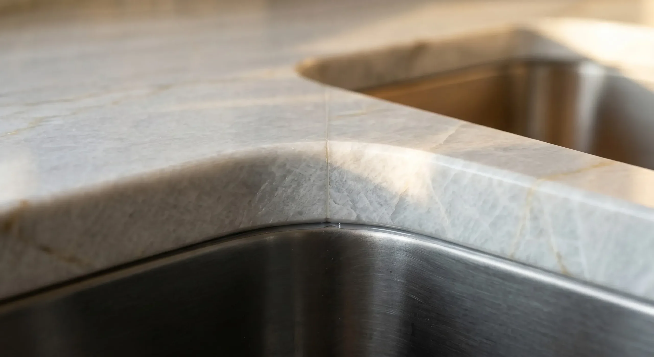 Close-up of a kitchen countertop edge profile and professionally set seam