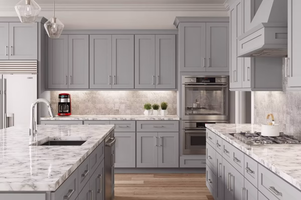 Luxury kitchen with waterfall island and full slab backsplash